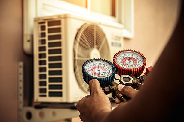 Professional Air Conditioning Service technician working in Neptune Beach, FL